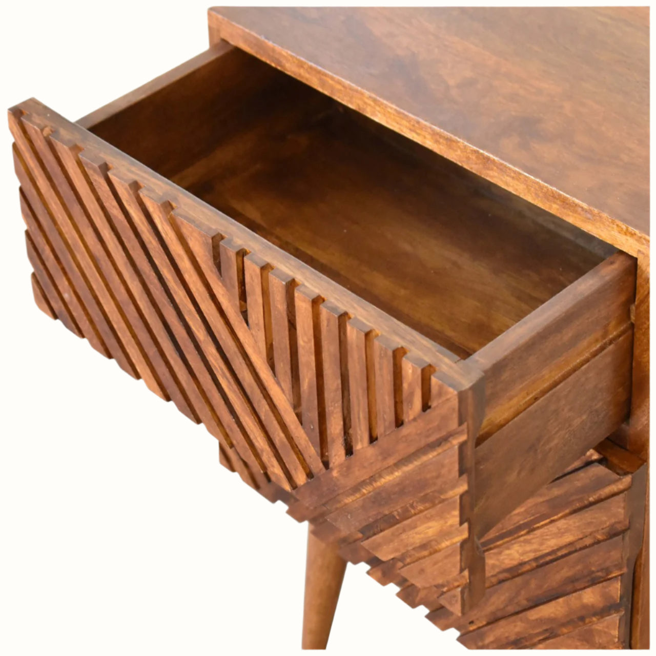Wooden drawer with geometric slat design on a white background