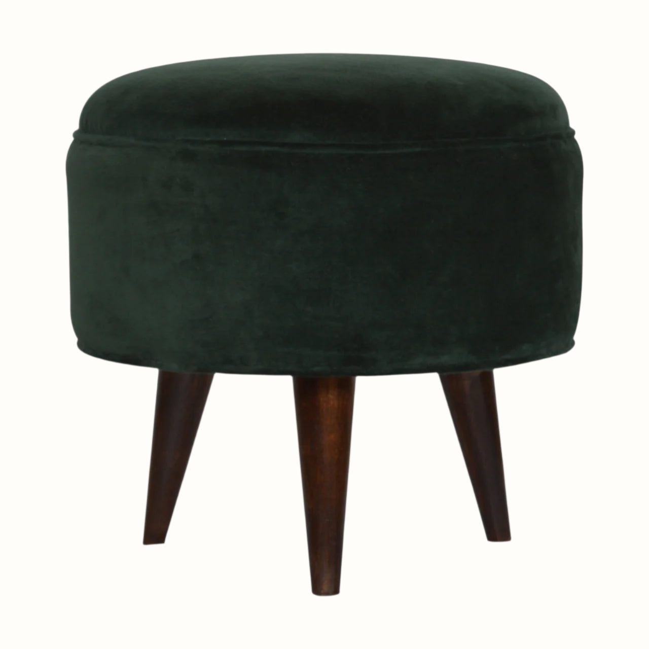 Round footstool upholstered in soft green fabric.
