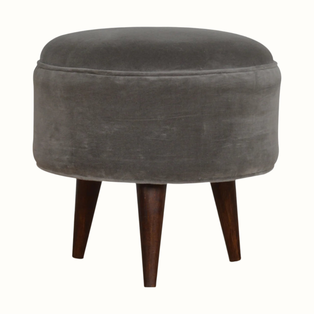 Round footstool upholstered in grey velvet.