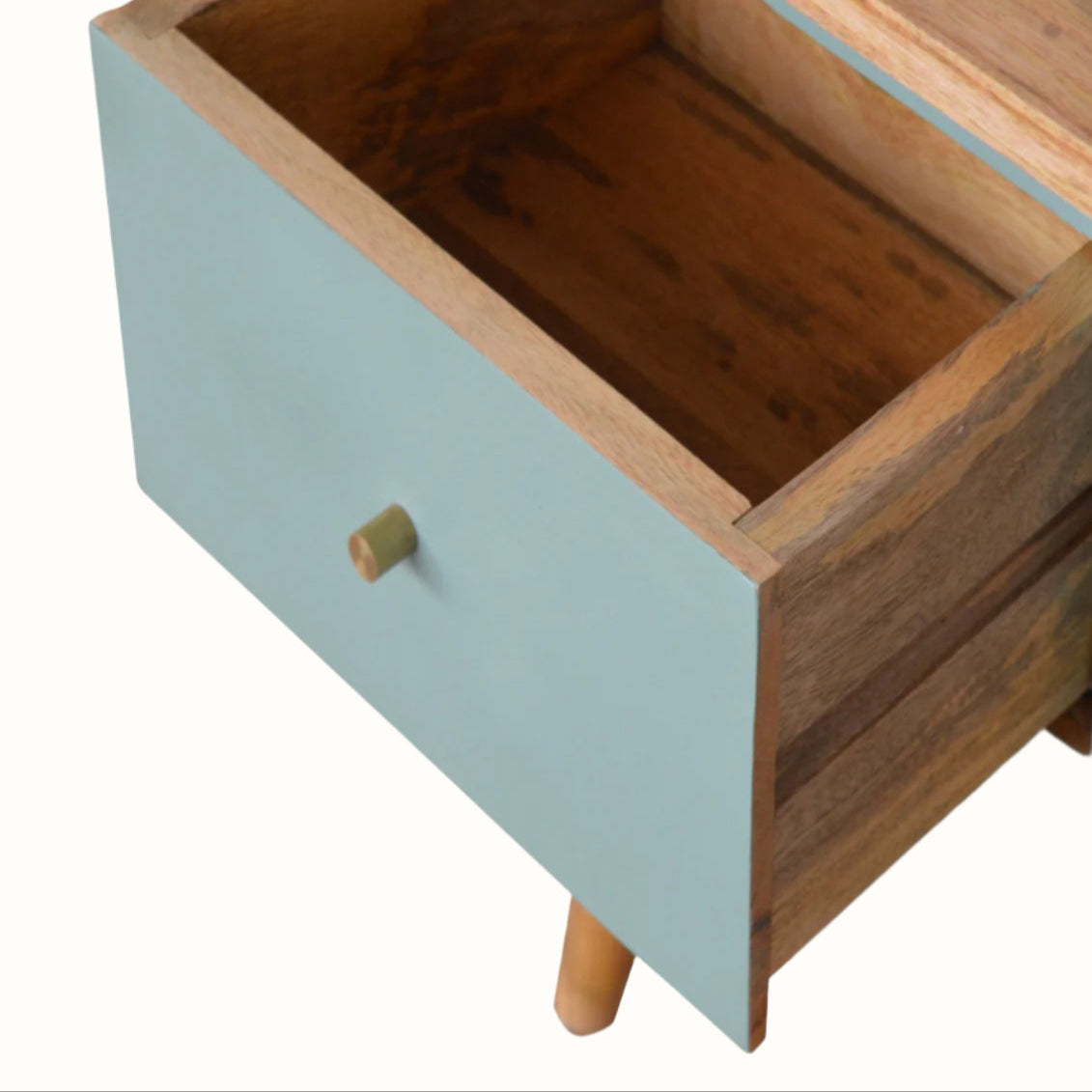 Wooden drawer unit with light blue base and wooden top on a white background