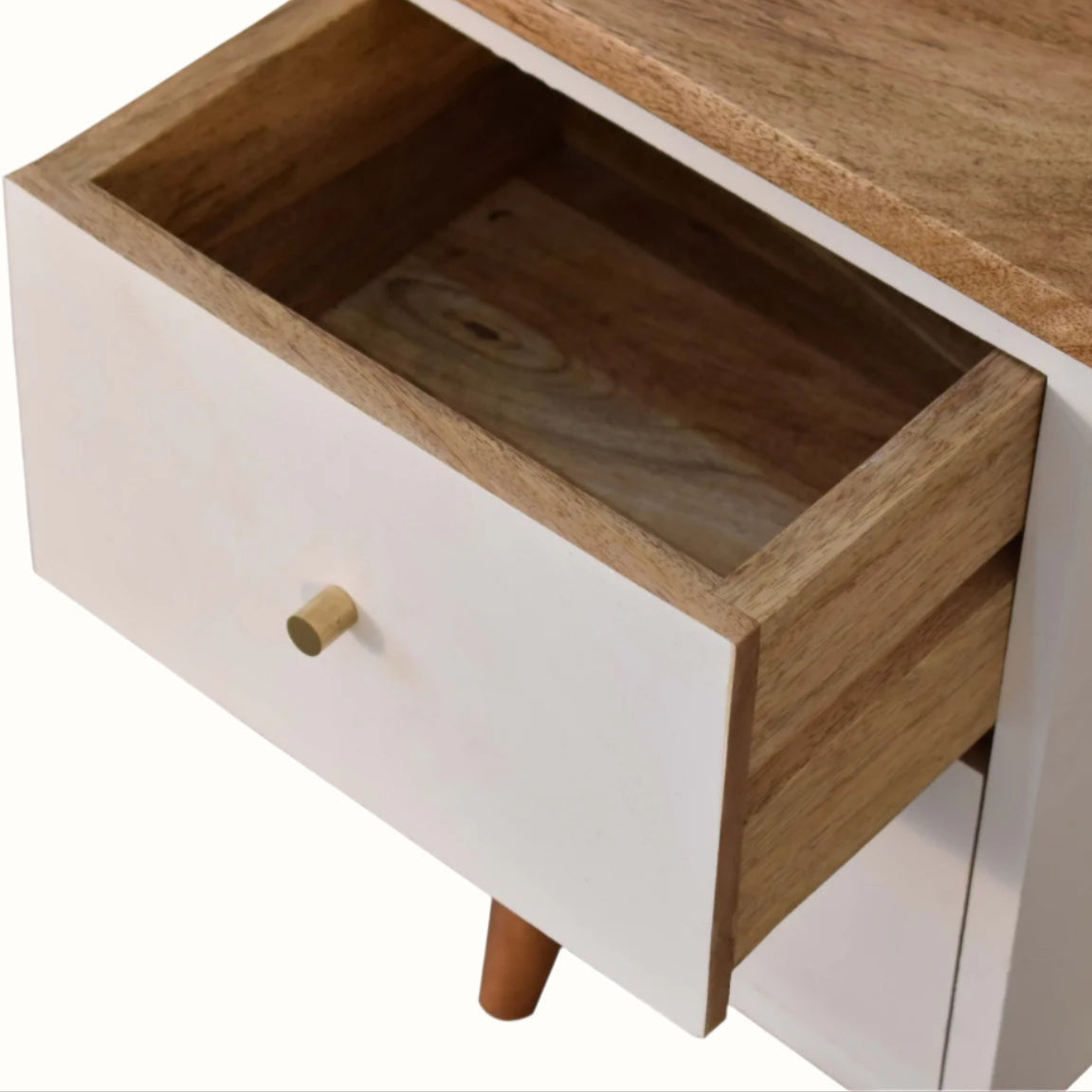 Wooden drawer with a white base on a white background