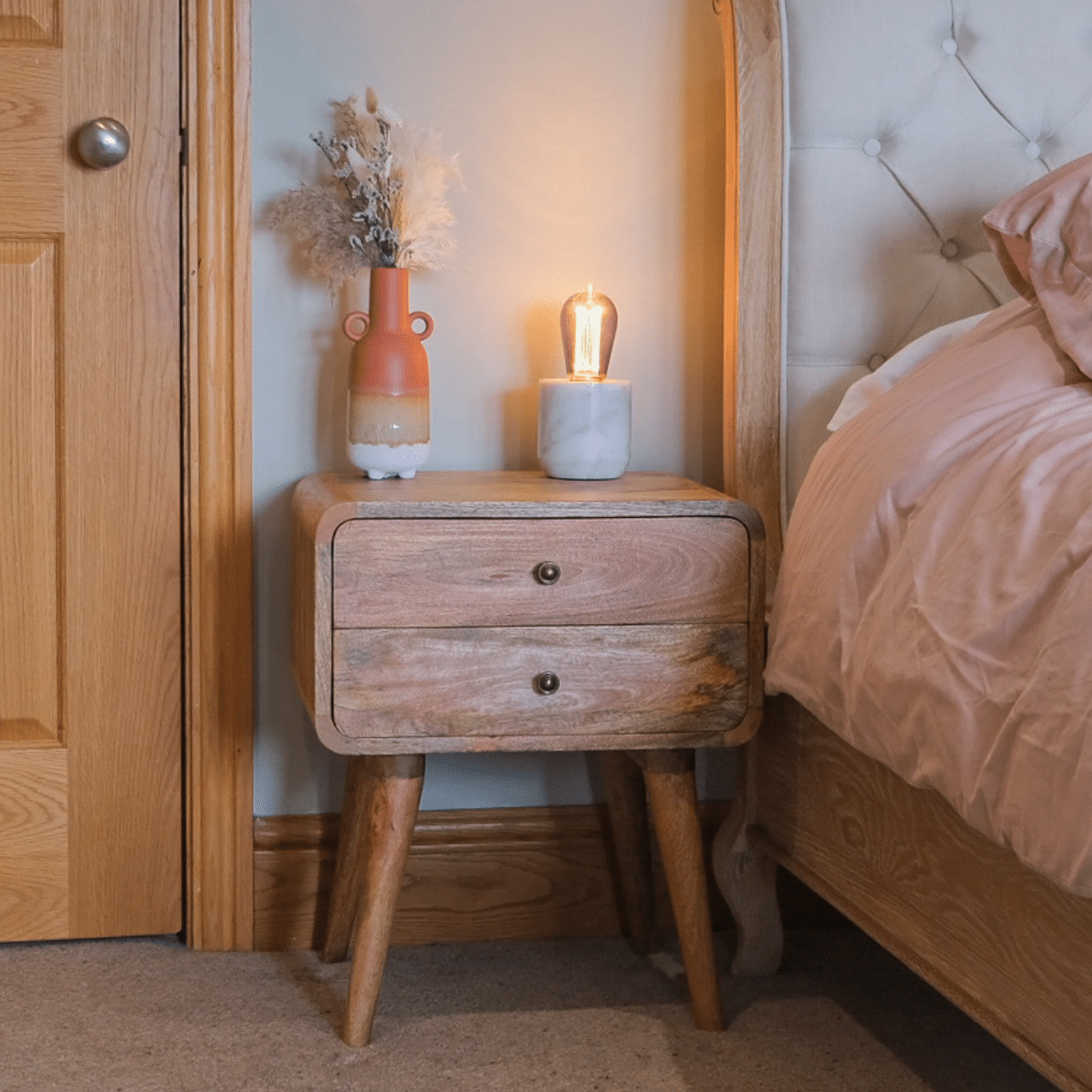 Scandinavian style bedside table, made from solid wood with storage.