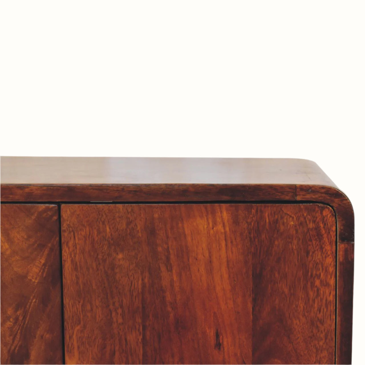 Close-up of a wooden sideboard with a white background