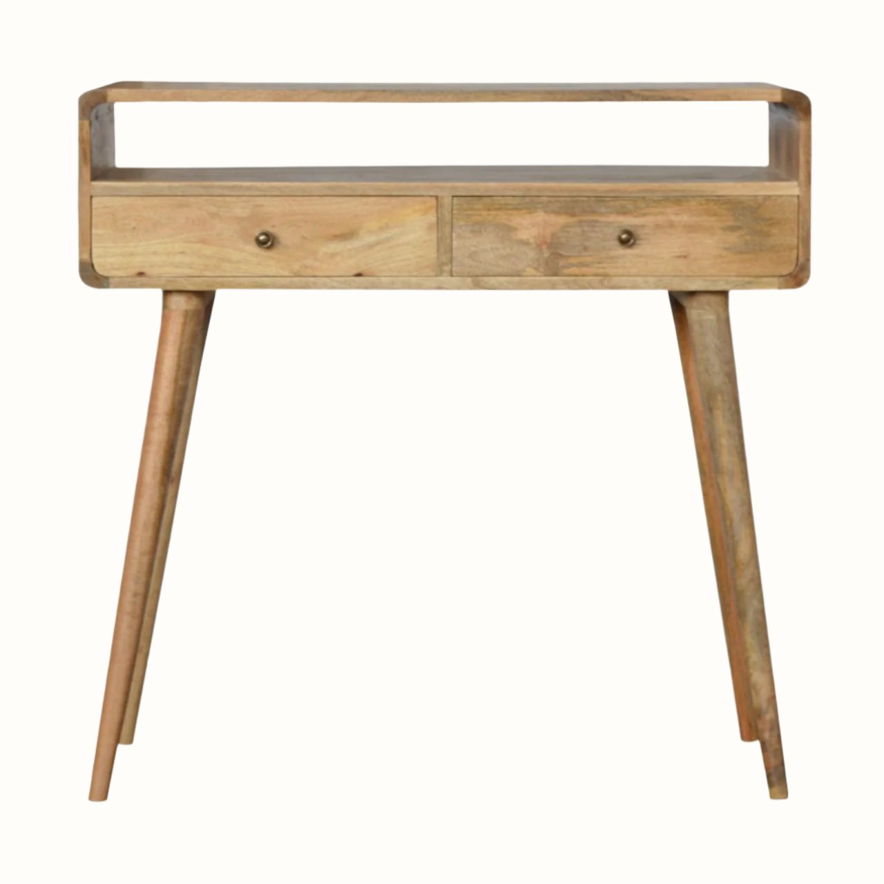 Light brown curved console table, made from solid wood, with an open slot shelf, and two drawers with brass knobs.