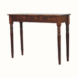 Wooden console table with three drawers on a white background