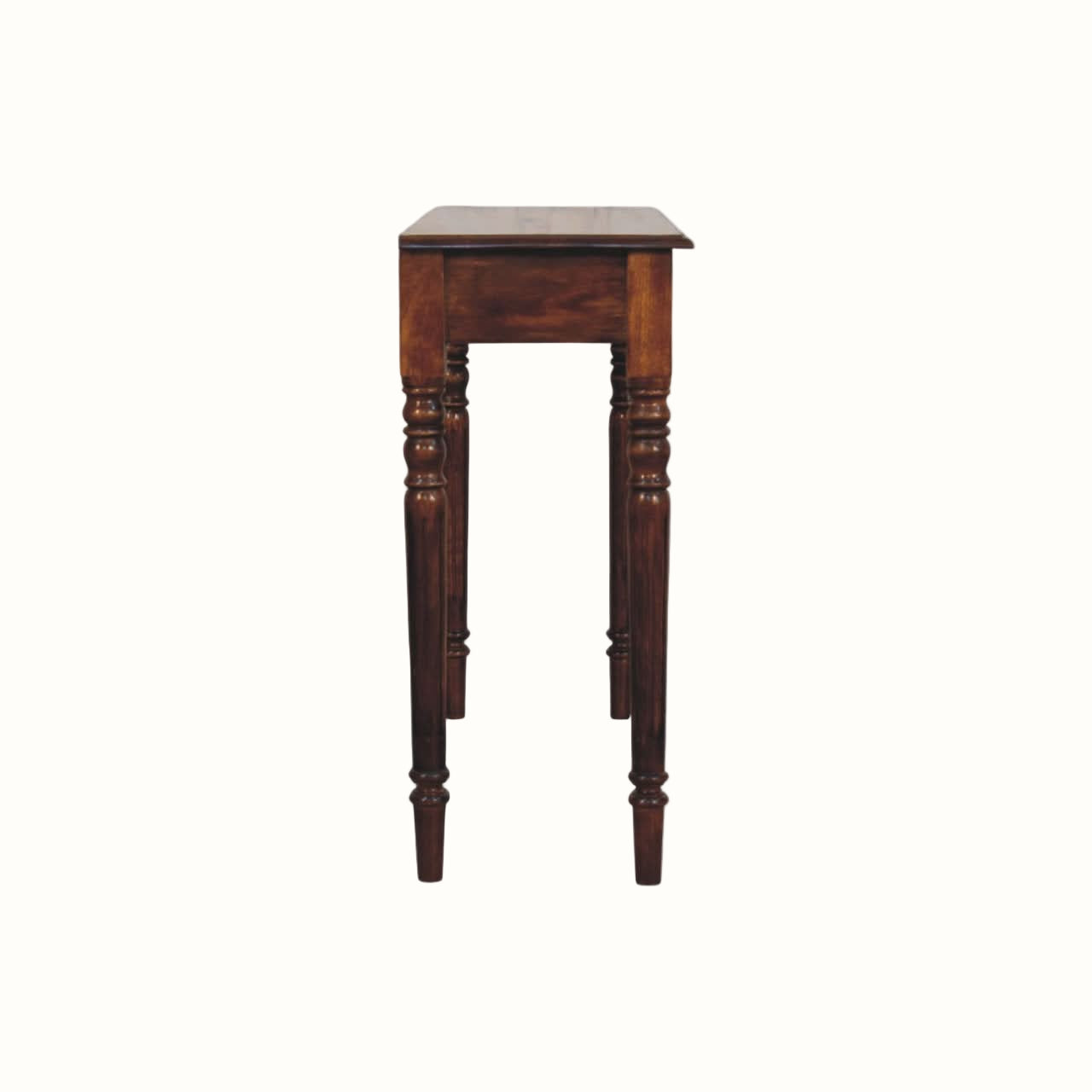 Wooden side table with turned legs on a white background