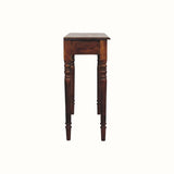 Wooden side table with turned legs on a white background