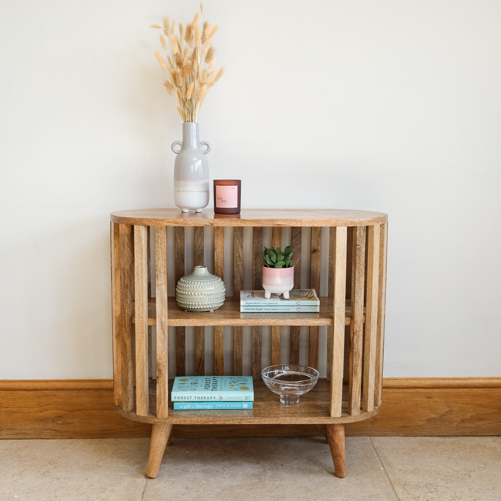 Open shelving cabinet made from mango wood, contempory style.