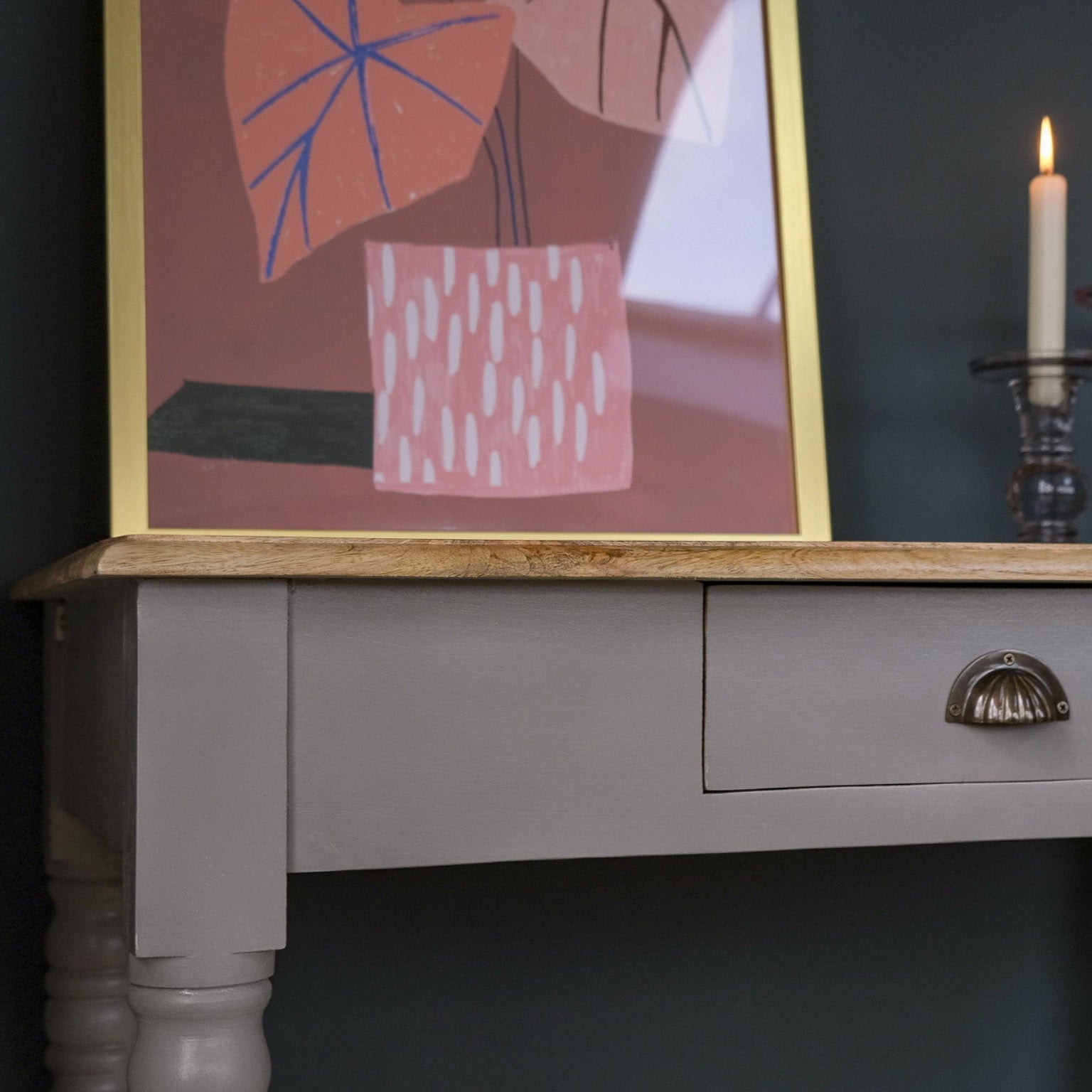 Side frame of grey painted wooden desk.