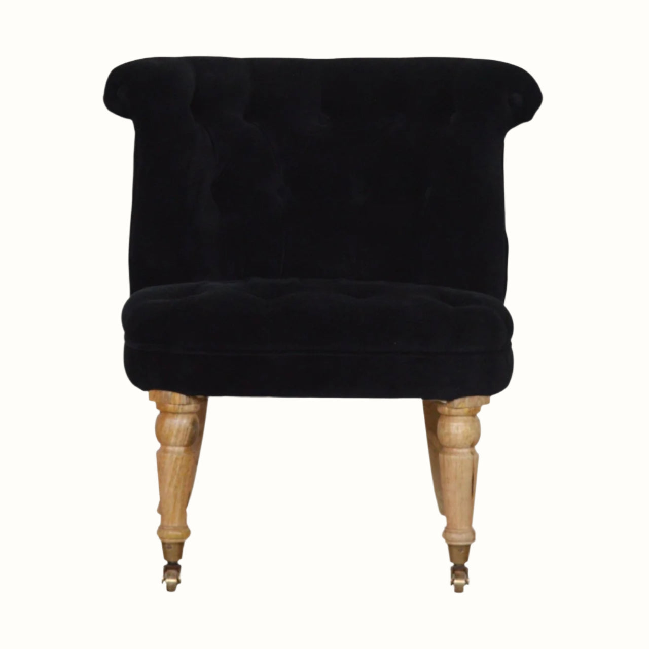 Vintage style seat in black velvet, with light wood legs.