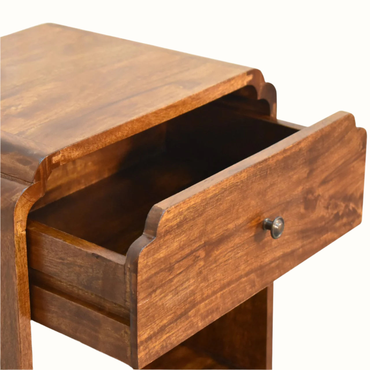 Wooden drawer with a metal handle on a white background
