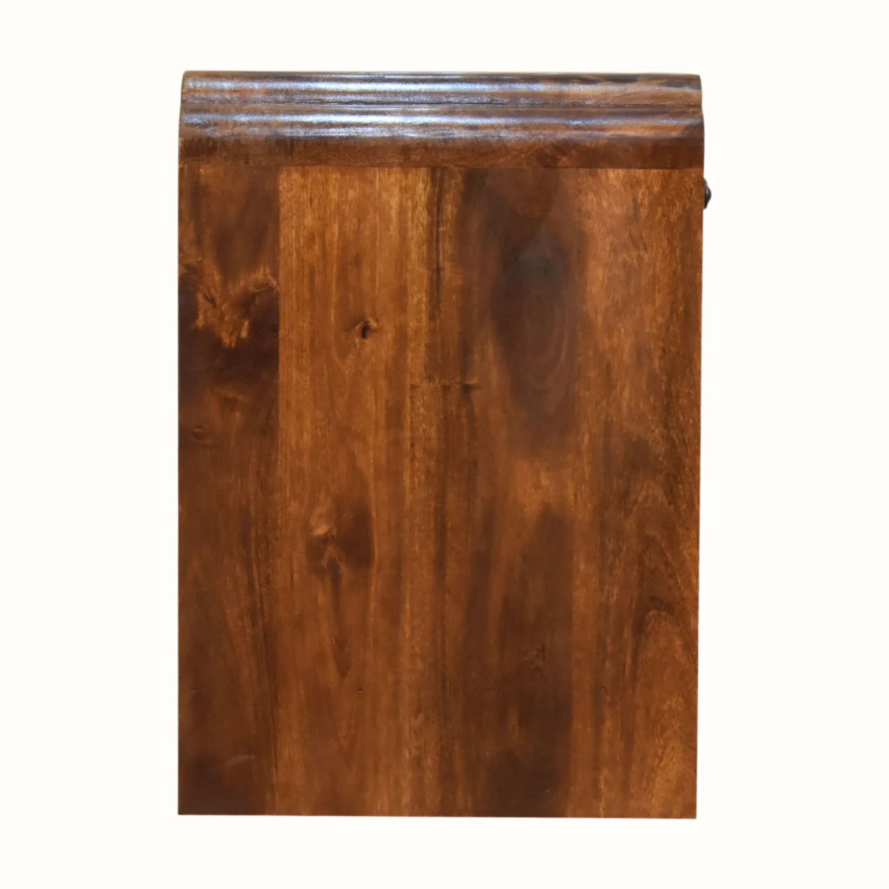 Side angle of wooden bedside table.
