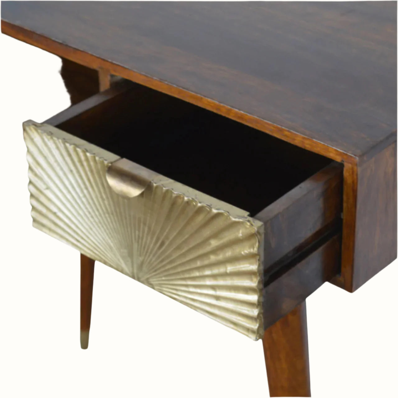 Wooden desk with a decorative drawer featuring a sunburst pattern.