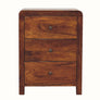 Curved bedside made from solid wood in a dark finish with 3 drawers.