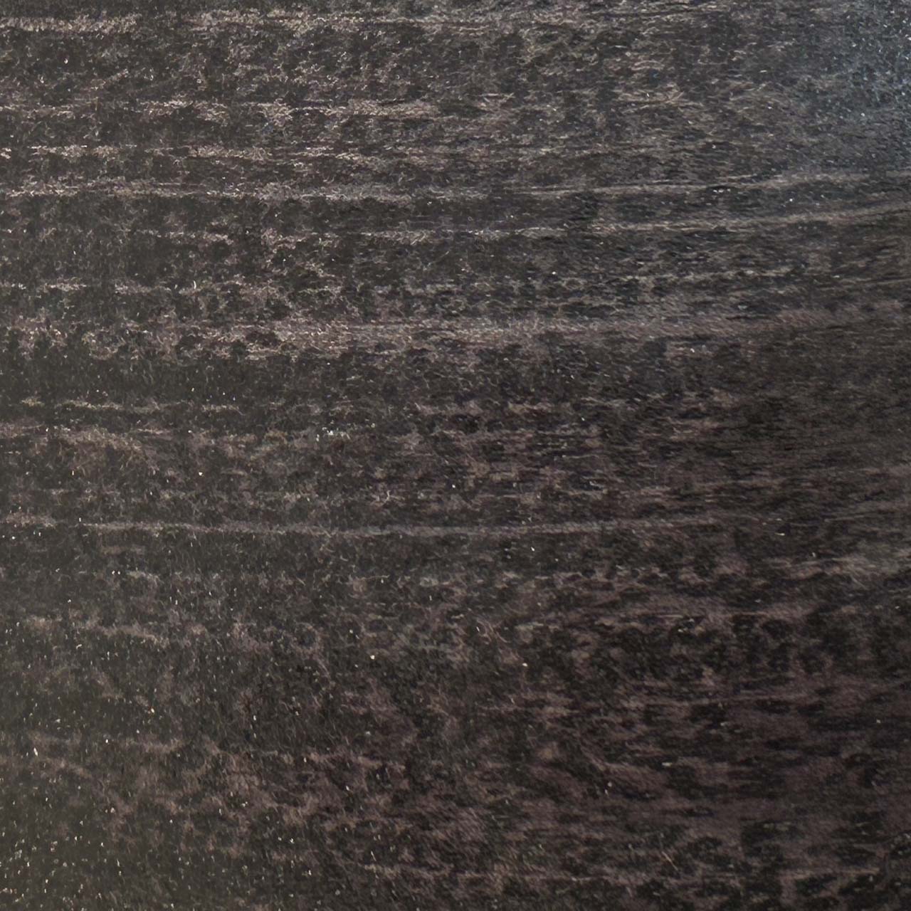 A close up photograph showing our ash black mango wood sample.