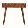 Wooden console table in dark brown stain, with line carved drawer fronts.