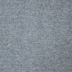 A close up photograph showing our black tweed sample.