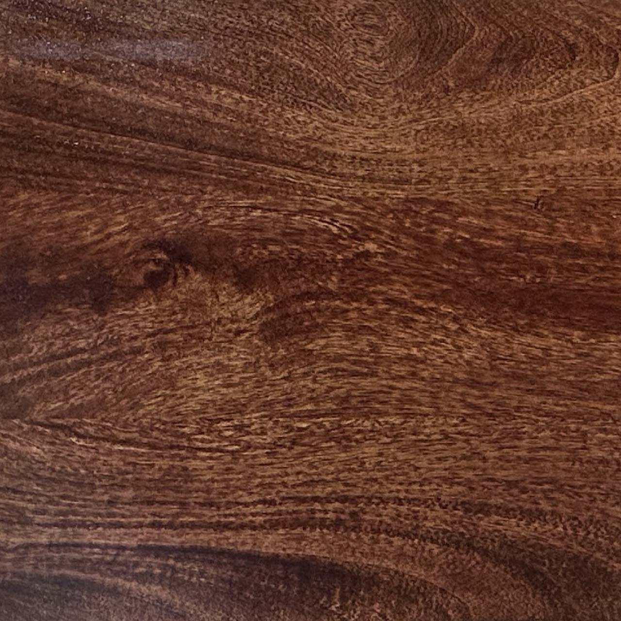 A close up photograph showing our california walnut mango wood sample.