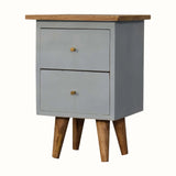 Small cabinet with two drawers and a wooden top on a white background