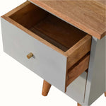 Wooden side table with open drawer on a white background