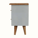 Small cabinet with a blue door and wooden top and legs on a white background