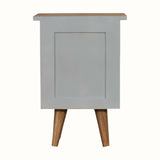 Small bedside table with light blue body and wooden legs and top on a white background