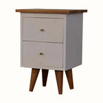 Small bedside table with two drawers and a wooden top on a white background