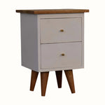 Small bedside table with two drawers and a wooden top on a white background