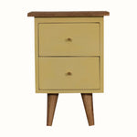 Hand painted wooden bedside table in a yellow finish, with 2 storage drawers, brass hardware and scandi-style legs.
