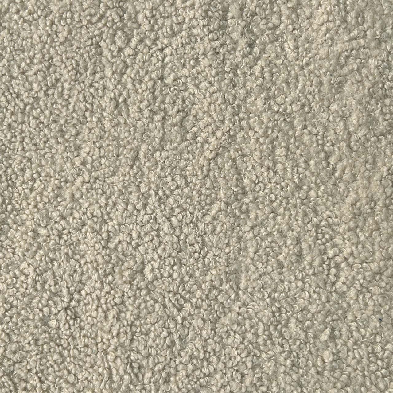 A close up photograph showing our cream boucle sample.