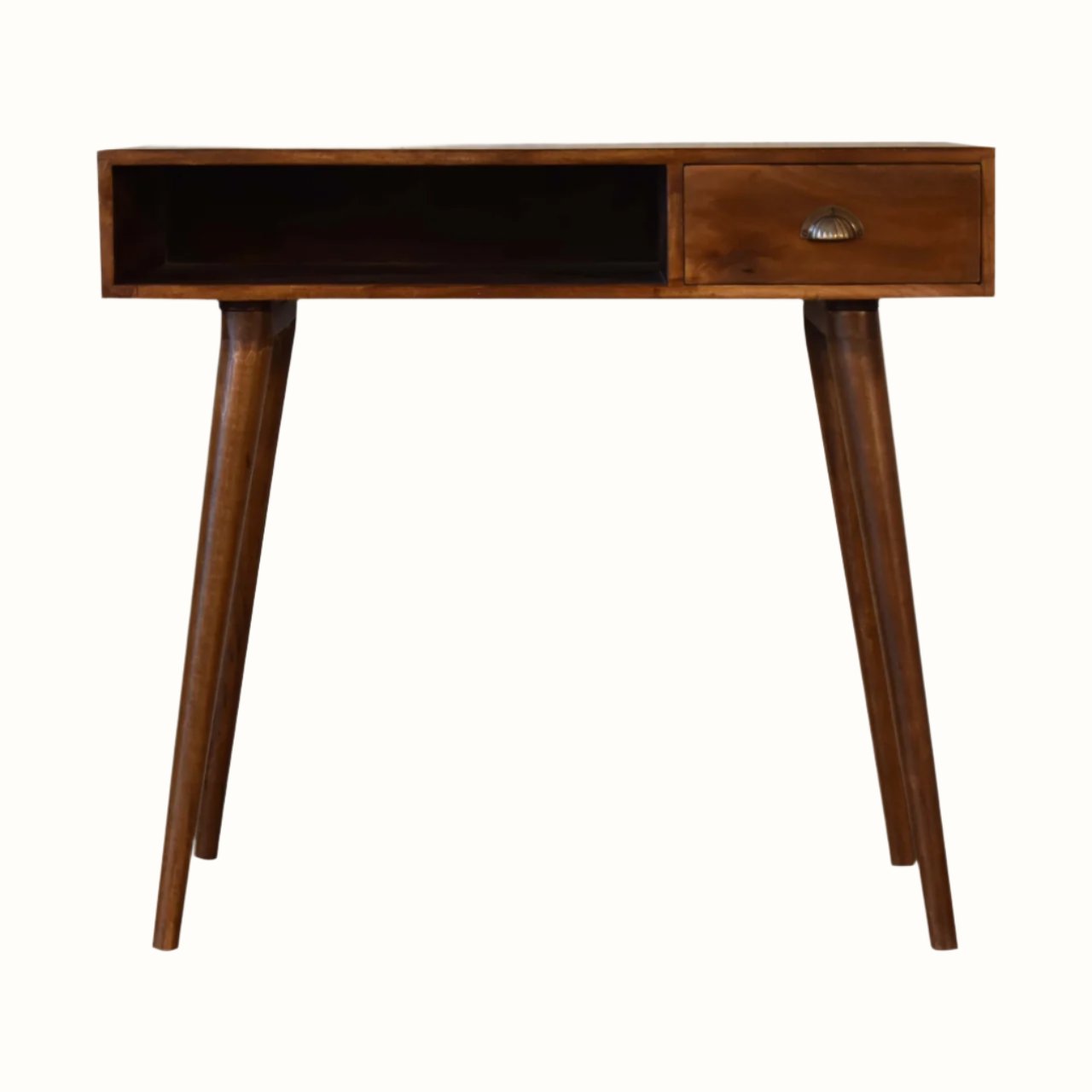 Nordic-style desk in a dark brown wooden finish, with an open slot shelf, single storage drawer, brass hardware and tapered legs.