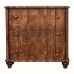 A rustic three-drawer wooden chest of drawers with a rich brown finish, featuring small round brass knobs and turned wooden feet, shown against a plain white background.