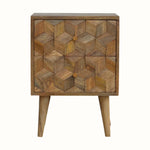 A medium-sized natural finish Felix bedside table with two drawers, featuring a textured cube-carved design, four Nordic-style legs, and brass knob detailing.