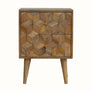 A medium-sized natural finish Felix bedside table with two drawers, featuring a textured cube-carved design, four Nordic-style legs, and brass knob detailing.