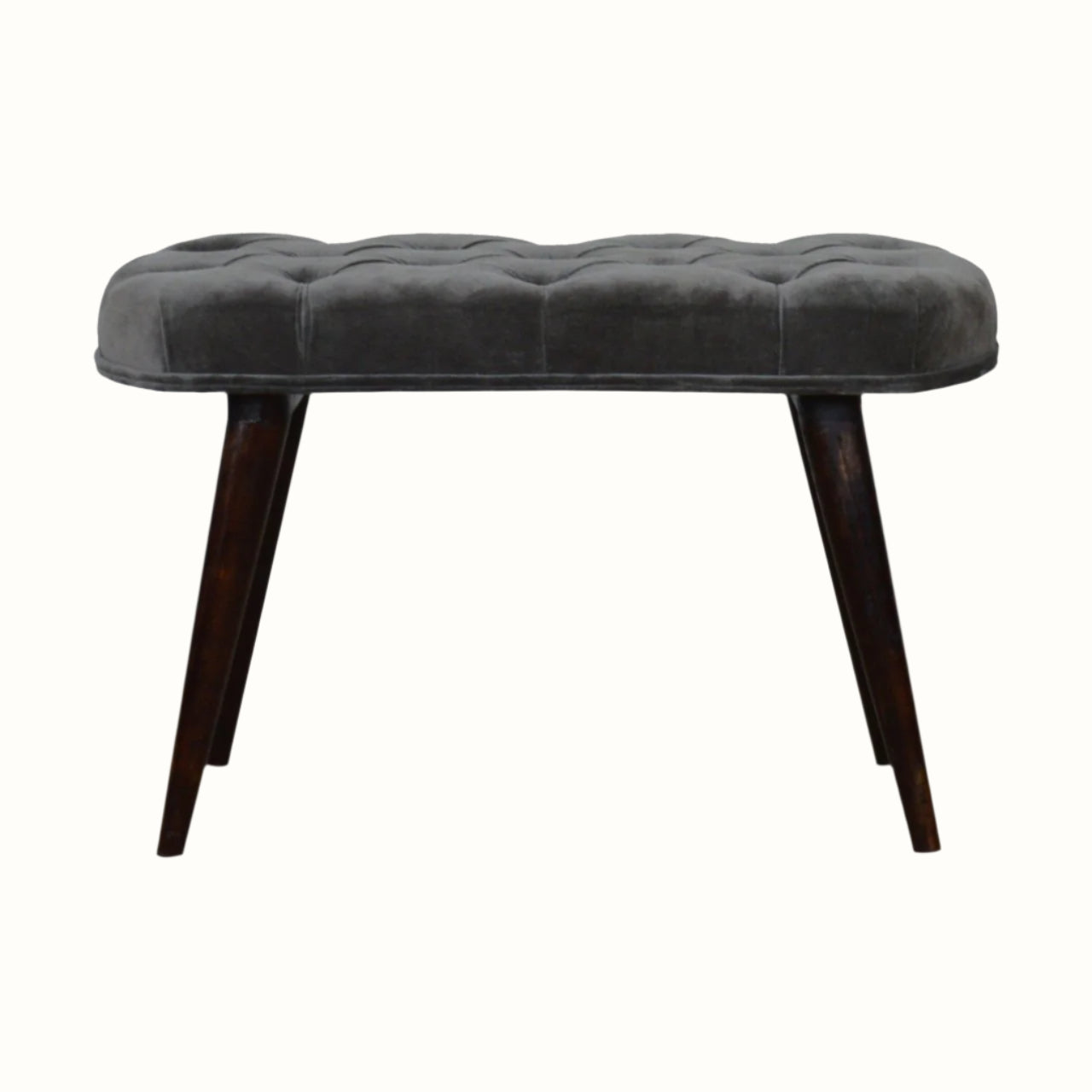 Rounded stool upholstered in grey velvet, with dark wood legs.