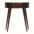 A semi-circular console table, crafted from solid mango wood  in a dark brown, california walnut finish and featuring a single drawer and long tapered legs.