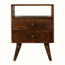 Square shaped wooden bedside in dark brown finish, with two drawers an an open slot shelf.