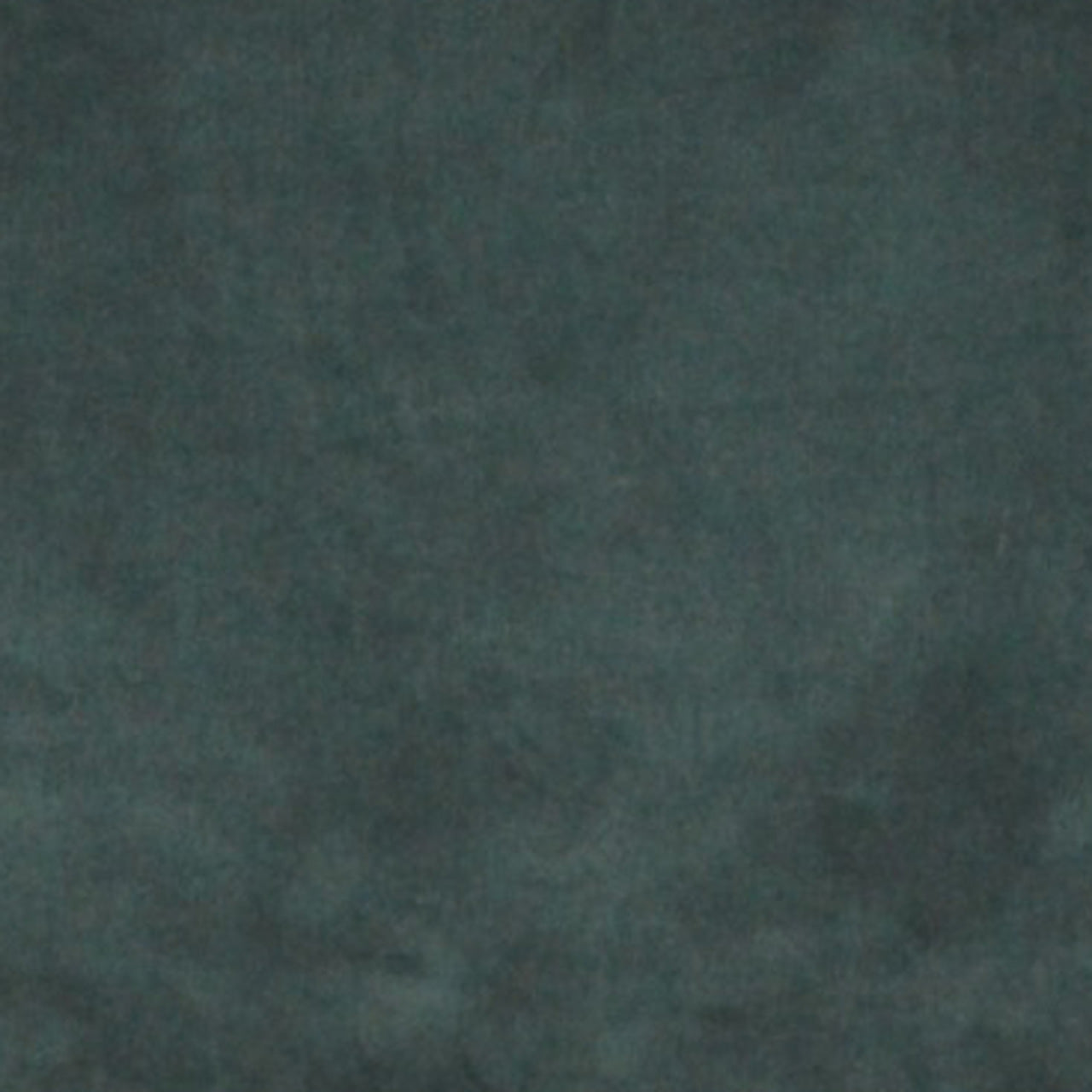 A close up photograph showing our forest green velvet sample.