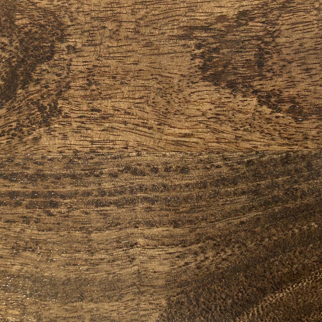 A close up photograph showing our grey wash mango wood sample.