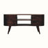 A walnut brown media unit with a curved silhouette, featuring two open slot shelves and four drawers with brass knobs.