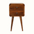 A small chestnut-colored bedside table with two drawers and four Nordic-style legs.