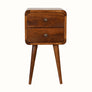 A small chestnut-colored bedside table with two drawers and four Nordic-style legs.