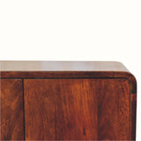 Close-up of a wooden sideboard with a white background