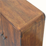 Close-up of a wooden cabinet with a focus on the texture and finish.