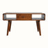 A rectangular Hamade coffee table with chestnut finish, featuring two open slot shelves and two drawers, supported by four short tapered legs with brass knobs.