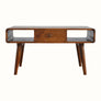 A rectangular Hamade coffee table with chestnut finish, featuring two open slot shelves and two drawers, supported by four short tapered legs with brass knobs.