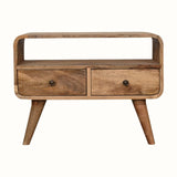 A small Hamade open TV stand made of solid mango wood with natural finish, featuring an open shelf and two drawers with brass knobs.