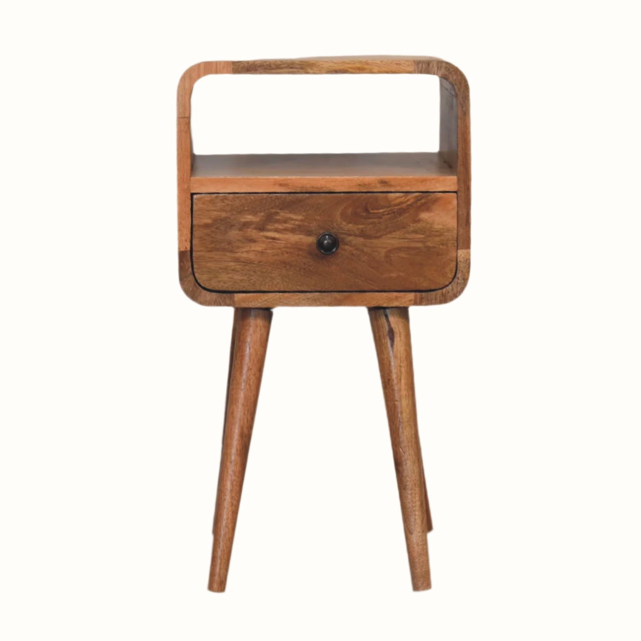 A small natural wood bedside table with an open shelf, a drawer, and a brass knob on a white background.