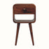 Solid wood bedside table in a medium brown stain, with lower open shelf, and upper drawer with brass knob.