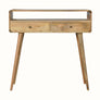 Light brown curved console table, made from solid wood, with an open slot shelf, and two drawers with brass knobs.
